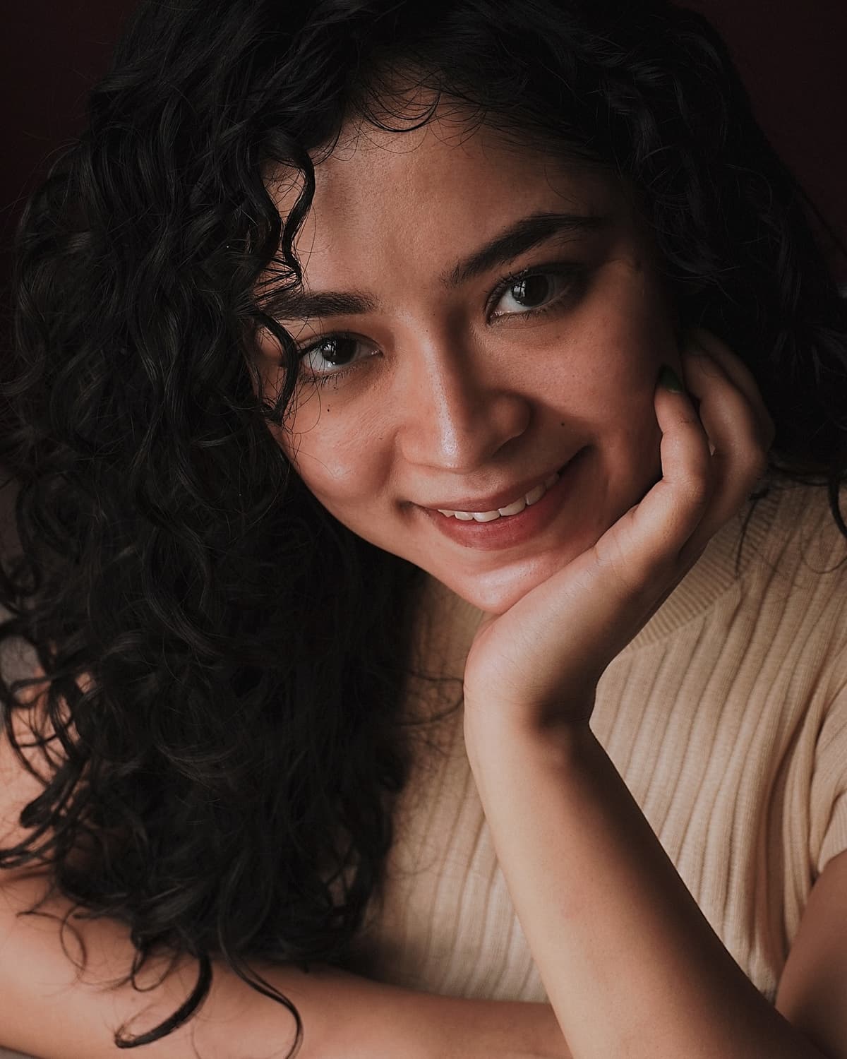 Portrait of Soumi Ghosh working in her studio.